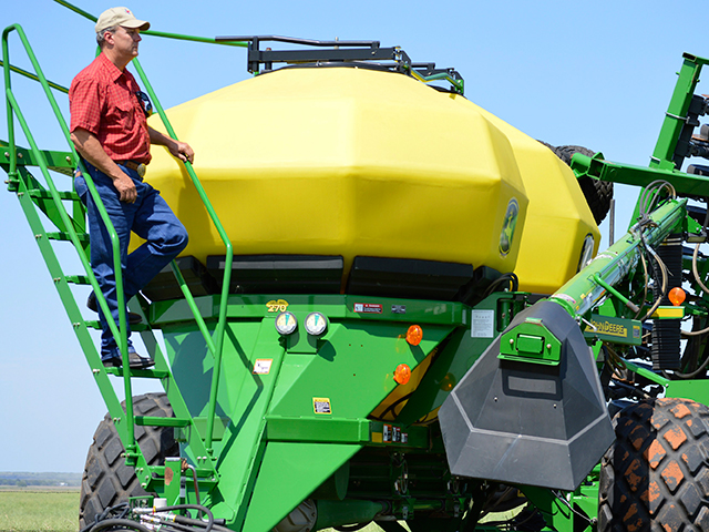 Tommy Henderson&#039;s John Deere air seeder plants every crop he grows with precision on his no-till farming operation, in Byers, Texas. (Progressive Farmer image by J.T. Smith)